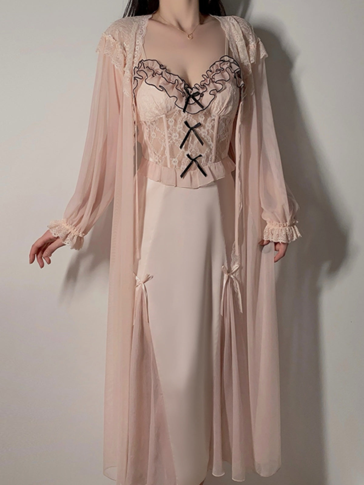 Romantic soft pink temptation, lace stitching satin nightgown with detachable tulle shawl, ruffles and lace embellishments, showing elegance and sexiness.