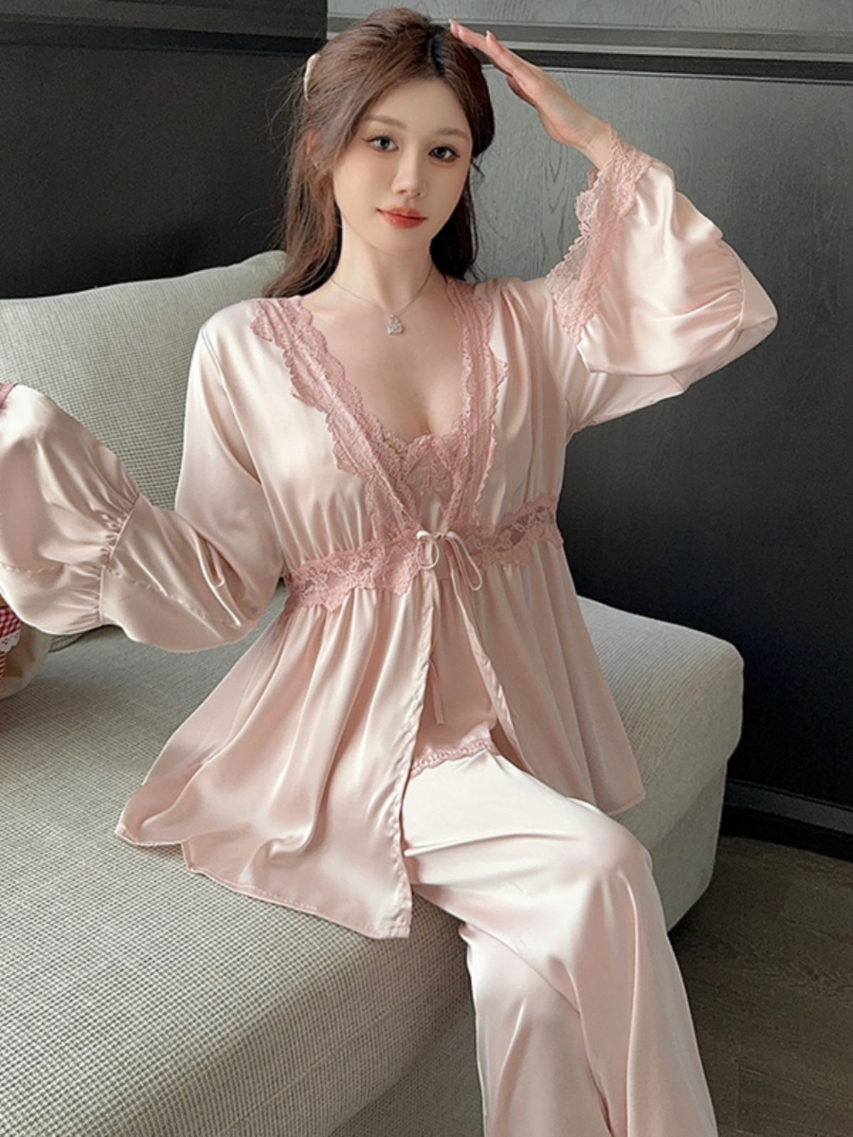 Alluring and Soft: Pink Satin Lingerie Ensemble with Deep V - neck Lace - Trimmed Cami, Flowy Lace - Cuffed Outer Blouse, and Matching Lace - Hemmed Pants