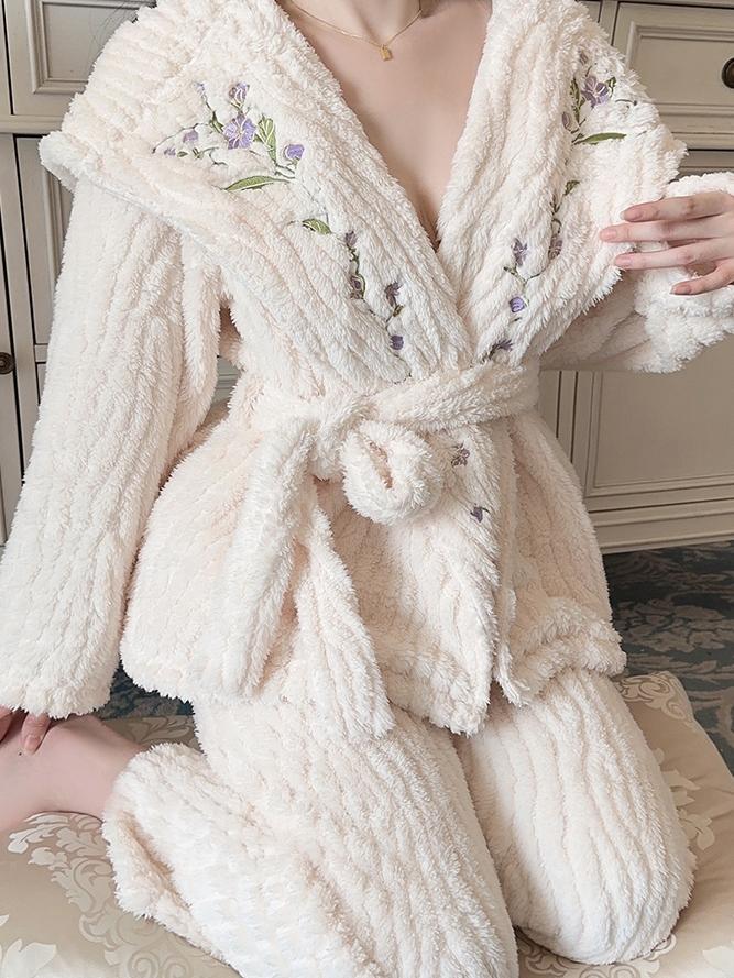 Cozy and Elegant: Cream - Hued Fleece Pajama Ensemble with Delicate Purple Floral Embroidery, Hooded V - neck Top, and Matching Textured Pants
