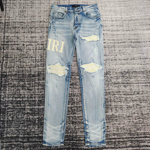 am fashion brand new washed damaged leather splicing slim fit micro-elastic jeans